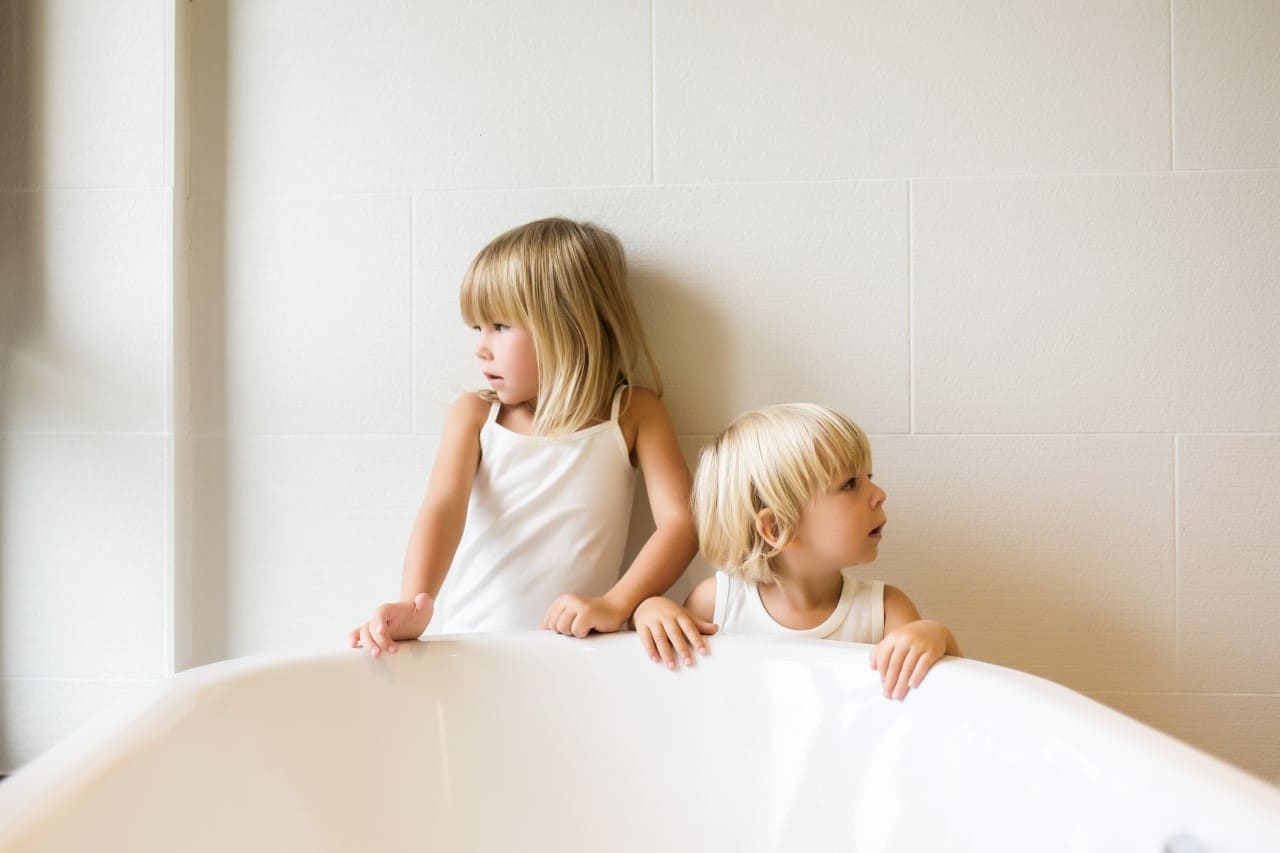 two-kids-on-bathtub